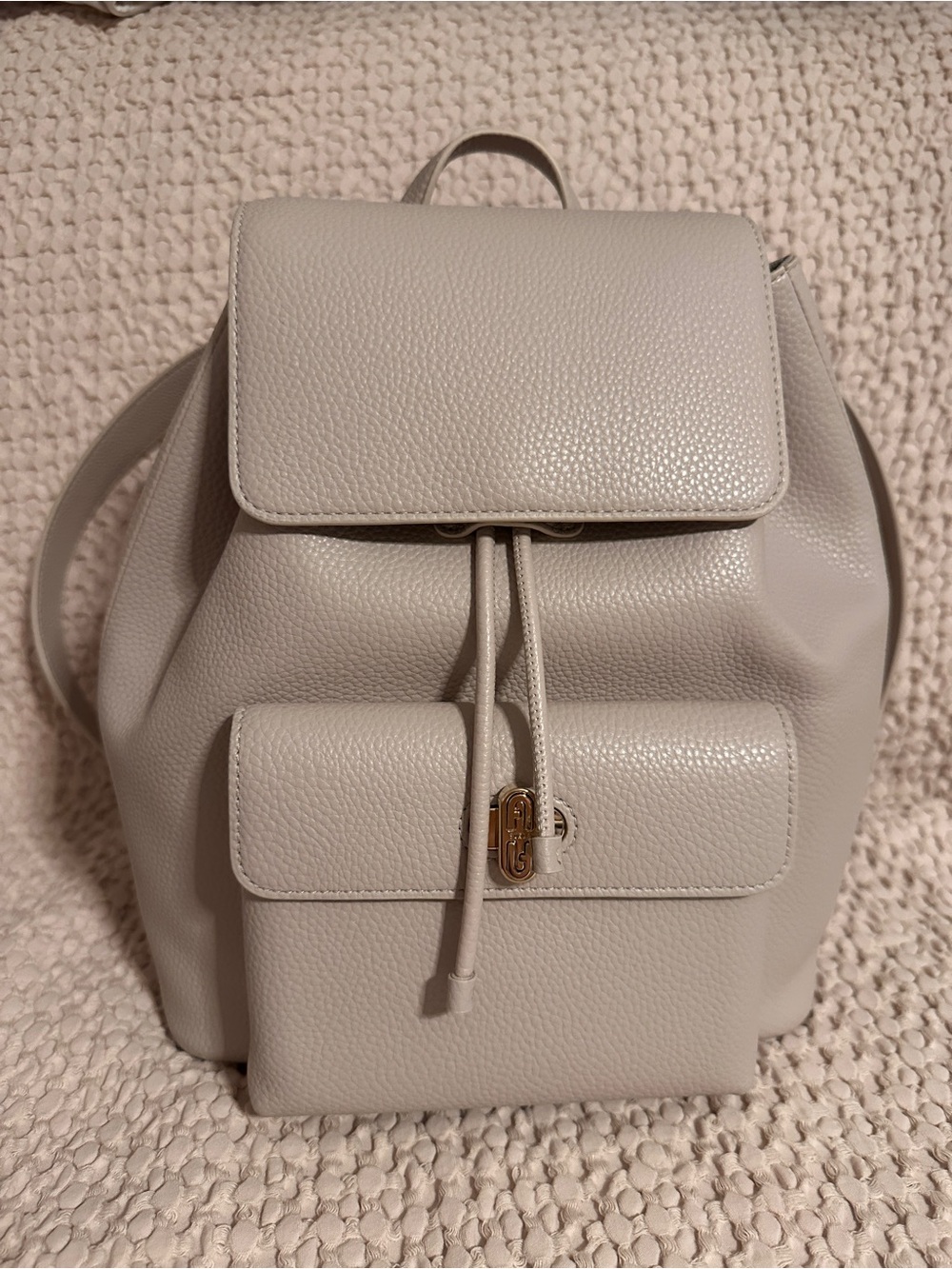 Furla Pebbled Leather Drawstring Backpack - Light Cream